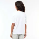 Remera oversize blanca de manga corta, con estampa frontal en tonos azules y amarillos con el texto "COSTA AZUL Palma de Majorque".