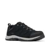 Championes de trekking Columbia modelo Crestwood, color negro con suela gris. Confeccionados con tecnología impermeable Omni-Tech y suela de alta tracción Omni-Grip, diseñados para caminatas y terrenos variados.