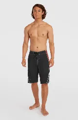 Short de baño tipo boardshort O'Neill modelo Superfreak Y2k, en combinación de colores negro, rojo y blanco, con diseño geométrico y cordón de ajuste en la cintura.