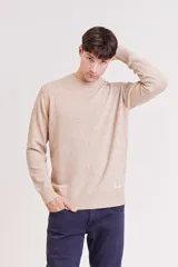 Sweater de punto con cuello redondo, diseño jaspeado en tono beige y puños y ruedo acanalados.