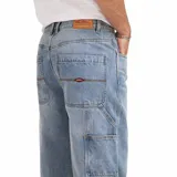 Jeans Quiksilver modelo Nilo para hombre, de corte amplio y relajado, color azul medio con efecto lavado.