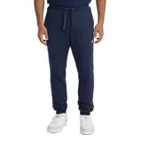 Pantalón de jogging azul marino con cintura elástica ajustable con cordón, corte ajustado y logo pequeño estampado en blanco en el muslo izquierdo.