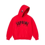 Hoodie de algodón color rojo con diseño de letras Supreme en negro con efecto goteo en el pecho y parche de máscara Ghostface en la capucha. Cuenta con bolsillo frontal tipo canguro.