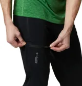 Pantalón de senderismo Columbia modelo Titan Pass, color negro, con diseño técnico de alto rendimiento. Cuenta con bolsillos laterales y bolsillo cargo con cierre, cintura elástica con cinturón integrado y tejido elástico en cuatro direcciones con tecnología de repelencia avanzada.