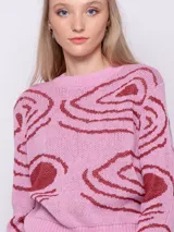 Sweater amarillo de tejido de punto con diseño de jacquard con ondas turquesas. Es de cuello redondo y manga larga.