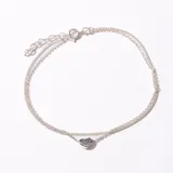 Pulsera de plata 925 con doble cadena y dije de corazón.