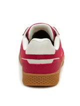 Sneakers Caterpillar modelo Pause Retro Canvas, de color rojo con detalles en blanco y suela de goma marrón.
