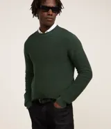 Suéter celeste de punto con textura acanalada horizontal, cuello redondo y mangas largas con puños ajustados.