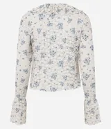 Blusa Blue Steel de encaje con estampado floral, escote en V y volados frontales, de manga larga.