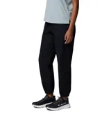 Pantalon tipo jogger de color negro, con cintura elástica ajustable, bolsillos laterales y traseros, y puños elásticos en los tobillos. Diseño funcional y resistente, ideal para actividades al aire libre y uso cotidiano.