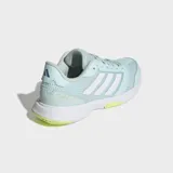 Championes Adidas Ligra 8 de diseño deportivo para cancha cubierta, color verde agua con las icónicas tres tiras laterales en blanco. Confeccionadas con exterior de malla transpirable y refuerzos de cuero sintético, cuentan con puntera Adituff para mayor resistencia y suela de caucho con detalles en verde lima.