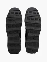 Zapatillas Tommy Jeans de corte bajo, color negro, con exterior de ante y detalles distintivos de la marca.