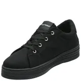 Championes de plataforma Hush Puppies modelo Ollie, color negro, confeccionados en poliéster reciclado. Presentan diseño de caña baja con cordones, suela de goma de doble altura y detalle de etiqueta con logo en el lateral y la lengüeta.