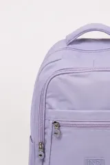 Mochila Paris de poliéster color rosado, con compartimentos múltiples con cierre y cartuchera pequeña a juego.
