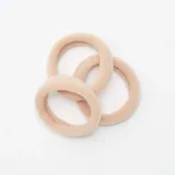 Pack de 10 gomas elásticas para el pelo en tonos variados, incluyendo verde oliva, beige, rosa suave y texturas brillantes.