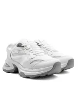Championes deportivos Santa Barbara modelo Stride de mujer, color blanco con suela chunky y detalles en gris.