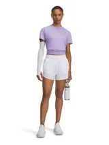 Remera deportiva Under Armour de manga corta, color lila, con diseño ajustado y detalle de fruncido lateral en la cintura.