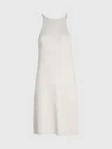 Vestido corto de punto acanalado color blanco, con cuello redondo y espalda estilo 'racer' con tirantes finos ajustables.