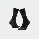 Medias deportivas tipo crew de la marca Stance, color negro con detalles en gris y líneas azules. Cuentan con tecnología Freshtek para mayor frescura y diseño ergonómico con refuerzos en talón y puntera.