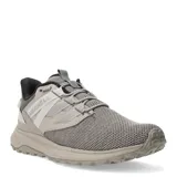 Championes Merrell modelo Dash Bungee, de diseño deportivo en tonos gris y beige. Presentan una parte superior de tejido de punto transpirable, sistema de ajuste con cordones elásticos y suela con relieve para mayor tracción.