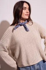 Sweater celeste de tejido de punto calado con lurex, de corte holgado y mangas largas.