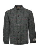 Chaqueta de hombre acolchada, color gris con estampado de cuadros en rojo, amarillo y azul. Tiene cuello camisero, cierre frontal de botones y dos bolsillos delanteros.