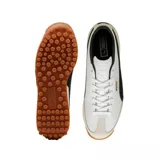 Championes Puma modelo Easy Rider Mix, en color blanco con detalles en negro, gris claro y suela de goma marrón con tacos. Cuenta con la franja característica de la marca en el lateral y el nombre en tono dorado.