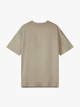 Remera de manga corta color beige, con ajuste relajado y corte estructurado.
