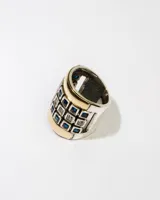 Anillo ancho de plata 925 con apliques de oro y zirconias azules y blancas.