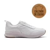Championes deportivos Usaflex Kerstin de cuero blanco, con cordones y suela de goma. Incorporan tecnología Low Impact para absorción de impactos y confort en el talón.