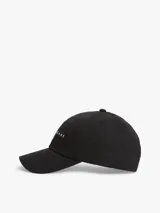 Gorra de béisbol negra de seis paneles en sarga de algodón, con logo lineal bordado de Tommy Jeans en el frente y cierre ajustable.