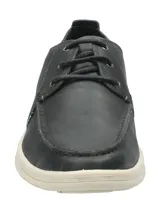 Zapato casual de cuero azul navy de la marca Rockford, modelo Adam. Cuenta con suela de goma blanca, cordones y detalles de costuras visibles.
