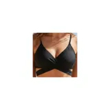 Conjunto de bikini de dos piezas de la marca Uniteduy, compuesto por un crop top amarillo liso con diseño cruzado y tirantes finos, y una bombacha de tiro alto con estampado floral y de hojas en tonos amarillos, verdes y blancos.