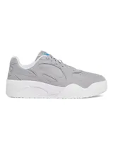 Championes Under Armour Court Anatomix Suede de color gris, con parte superior ligera y revestimientos de gamuza resistente. Cuenta con entresuela de EVA acolchada y suela exterior de goma gruesa en color blanco.