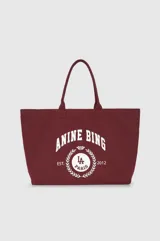 Bolso tipo tote de lona color bordó sin forro, con doble asa superior y estampado frontal con el logotipo de la marca de inspiración universitaria en color blanco.