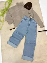 Sweater de cuello alto con diseño de rombos texturizados, de corte oversized y mangas largas.