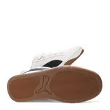 Championes urbanos Puma modelo Park Lifestyle Easy Sd, color beige con franja lateral negra, confeccionados en gamuza con suela de goma color caramelo.