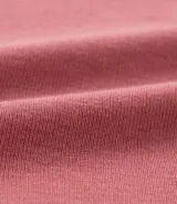 Blusa tipo muscle tee de Ashua, confeccionada en tejido ribana con textura acanalada, cuello redondo y diseño sin mangas.