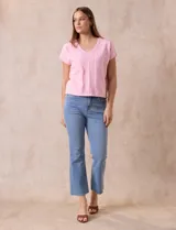 Buzo tejido color blanco, marca Ninety. Escote en V. Calado en escote y delantera.