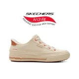 Championes casuales Skechers Slip-ins Arch Fit Arcade color blanco, con detalles en tono oro rosado en los ojalillos, el talón y la suela. Presentan diseño sin cordones tradicionales y tecnología Arch Fit para soporte en el arco.