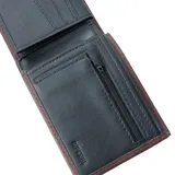 Billetera Rip Curl de poliuretano color negro con logo en relieve.