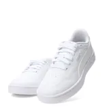Championes urbanos Puma modelo Court Lally, de diseño clásico en color blanco total, con cierre de cordones y suela de goma resistente.
