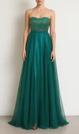 Vestido largo de fiesta color petróleo, con corpiño strapless bordado con lentejuelas plateadas y falda de tul.