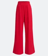 Pantalón wide leg rojo confeccionado en viscolino con cintura elástica y bolsillos laterales.