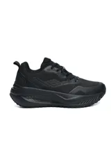 Championes deportivos Umbro modelo Fly, de color negro, con capellada de malla transpirable, suela gruesa y diseño ergonómico.