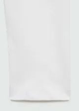 Camiseta de manga larga con cuello barco y diseño recto, confeccionada en tejido de algodón.