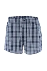 Pack de tres calzoncillos tipo bóxer de tela de algodón, con cintura elástica. Incluye un calzoncillo liso celeste y dos calzoncillos a cuadros en tonos azul y rojo.