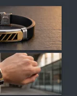 Pulsera de diseño moderno compuesta por una banda de goma negra y una placa central de acero inoxidable con detalles en baño de oro y aberturas geométricas. Incluye cierre de seguridad de acero.