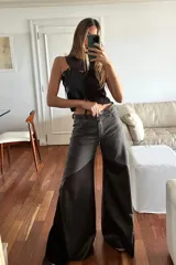 Pantalón wide leg confeccionado con tres cueros ovinos distintos: chocolate, gris desgastado y gamuza chocolate.