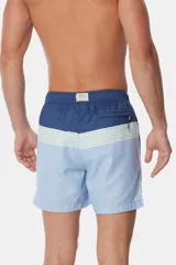 Short de baño de microfibra de secado rápido con diseño a rayas en tonos azul, celeste y rosado, con cintura elástica y cordón ajustable.